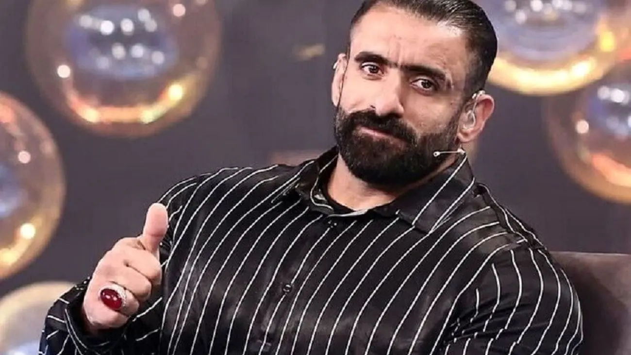 عکس حسرت برانگیز از زندگی هادی چوپان / غرق مدال و طلا !