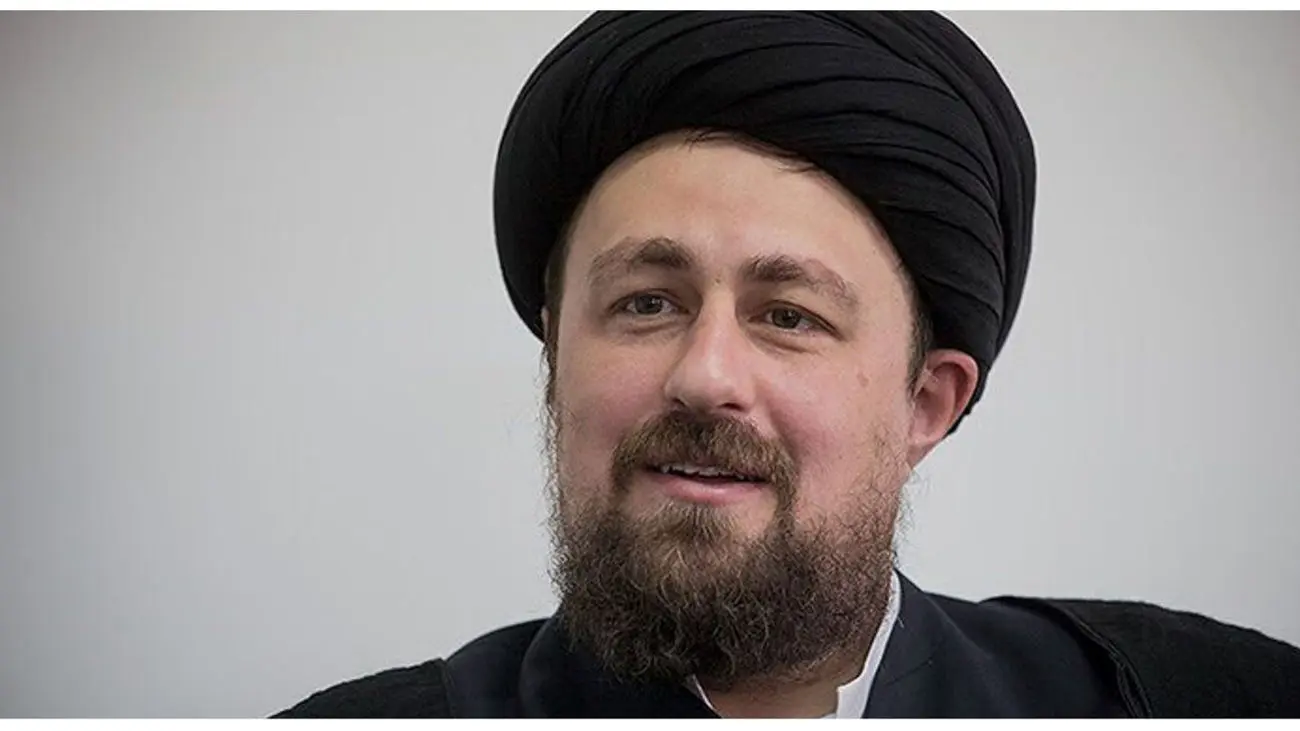 عکسی از سیدحسن خمینی و پسرش پای صندوق رای